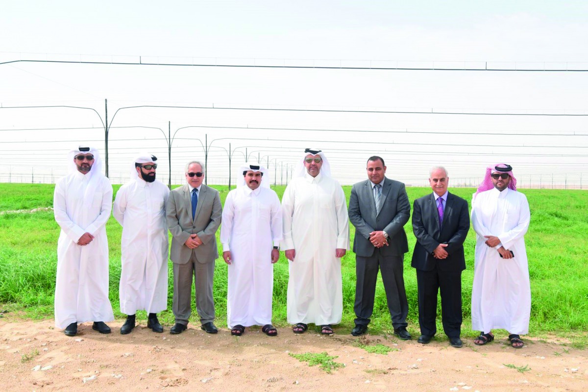 Minister of Economy and Commerce, H E Sheikh Ahmed bin Jassim bin Mohamed Al Thani, with other officials at a fodder farm in Umm Ghuwailina
