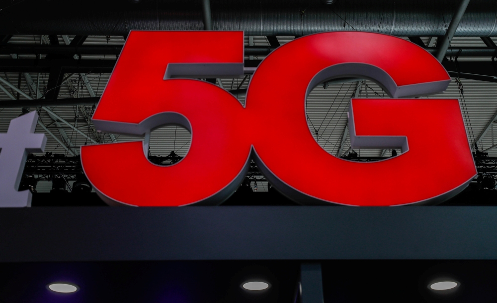 A 5G sign is seen during the Mobile World Congress in Barcelona, Spain February 28, 2018. Reuters/Yves Herman