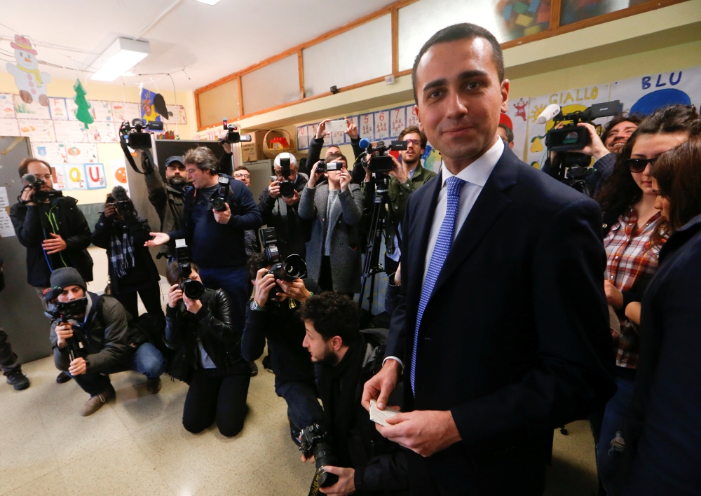 5-Star Movement leader Luigi Di Maio arrives to cast his vote at a polling station in Pomigliano d'Arco, near Naples, Italy March 4, 2018. Reuters/Ciro De Luca