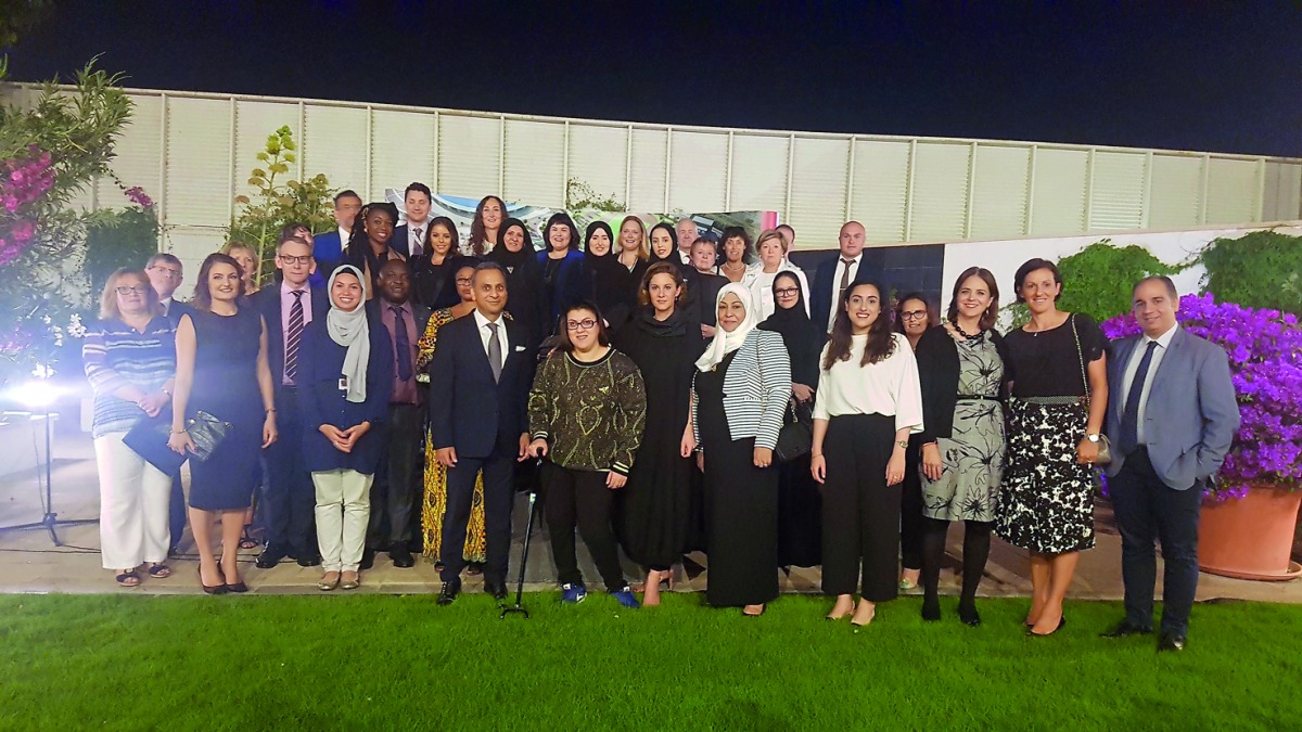 British Ambassador to Qatar, Ajay Sharma, with women guests.