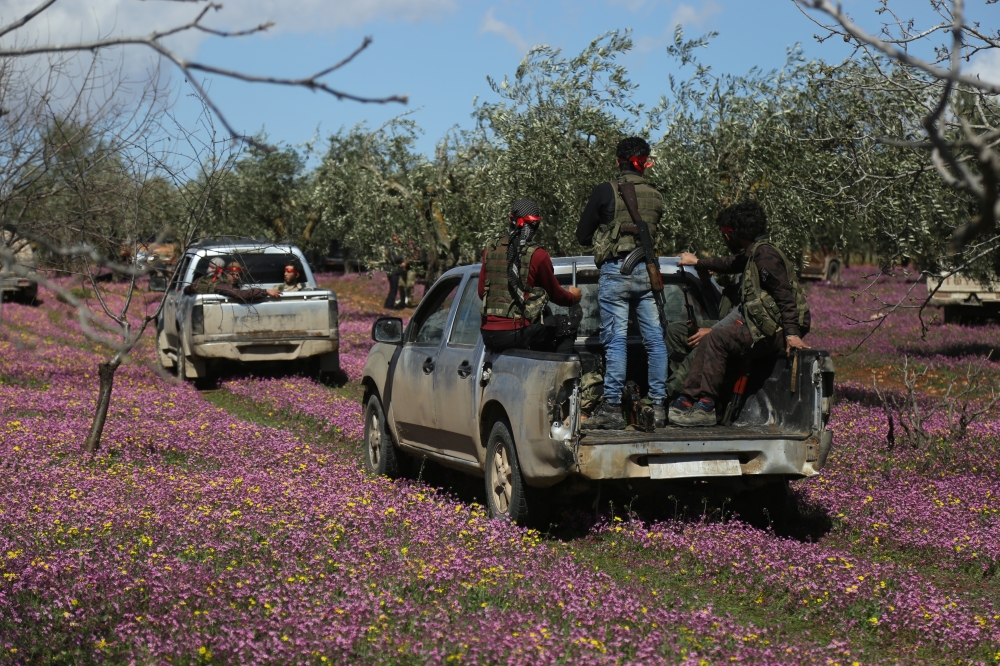 Members of Free Syrian Army (FSA) control the area after Turkish Armed Forces and FSA members cleared from PYD/PKK-Daesh terrorists within the 