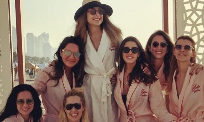 The last photo on Mina Barasan's Instagram account showed her surrounded by seven other young women, all wearing robes and sunglasses. The post, tagged #minasbachelorette, said it was taken at the One and Only Royal Mirage luxury hotel in Dubai.