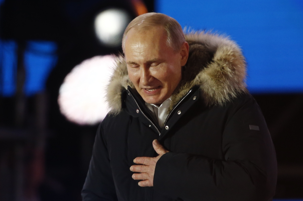 Presidential candidate, Russian President Vladimir Putin speaks to his supporters after the presidential elections in Moscow, Russia on March 18, 2018. (Sefa Karacan - Anadolu Agency)