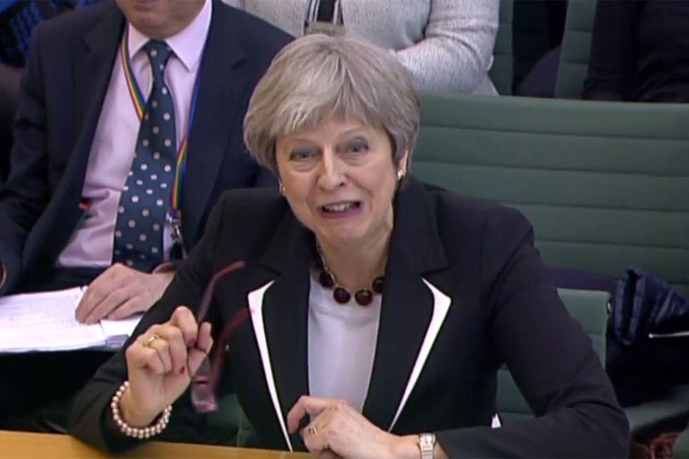 A video grab from footage broadcast by the UK Parliament's Parliamentary Recording Unit shows Britain's Prime Minister Theresa May appearing as a witness before the Liaison Committee of members of parliament at the Houses of Parliament in central London o