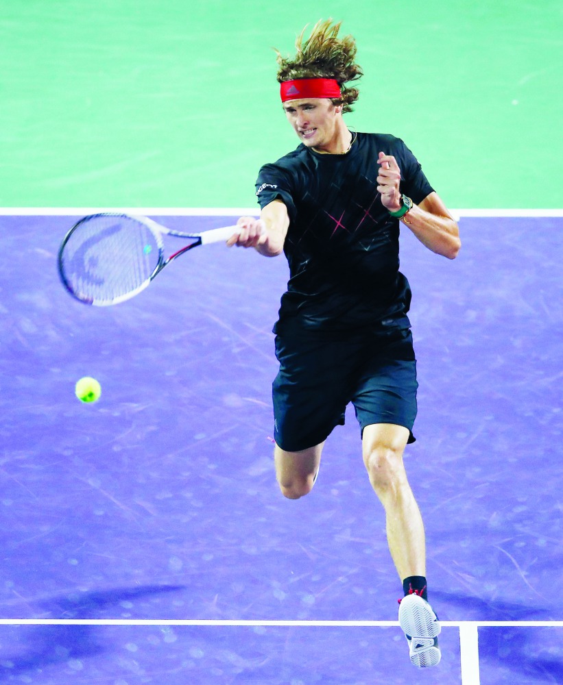 Alexander Zverev of Germany plays a forehand against Borna Coric of Croatia in their quarterfinal match during the Miami Open Presented by Itau at Crandon Park Tennis Center on March 29, 2018 in Key Biscayne, Florida. Clive Brunskill/Getty Images/AFP