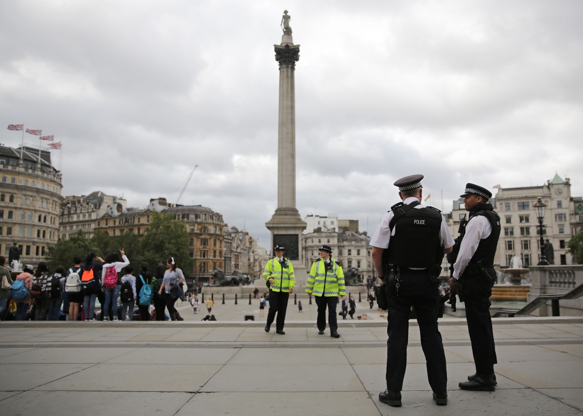 Armed police personnel patrol in London's Trafalgar Square on August 4, 2016. (AFP)