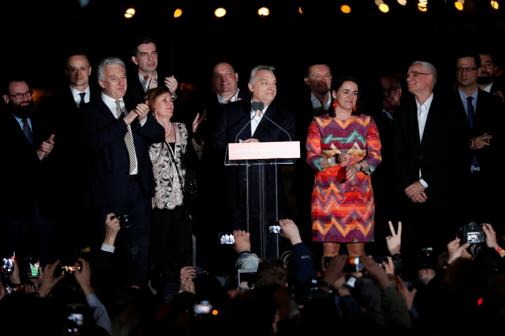 Hungarian Prime Minister Viktor Orban addresses supporters after the announcement of the partial results of parliamentary election in Budapest, Hungary, April 8, 2018. REUTERS/Bernadett Szabo