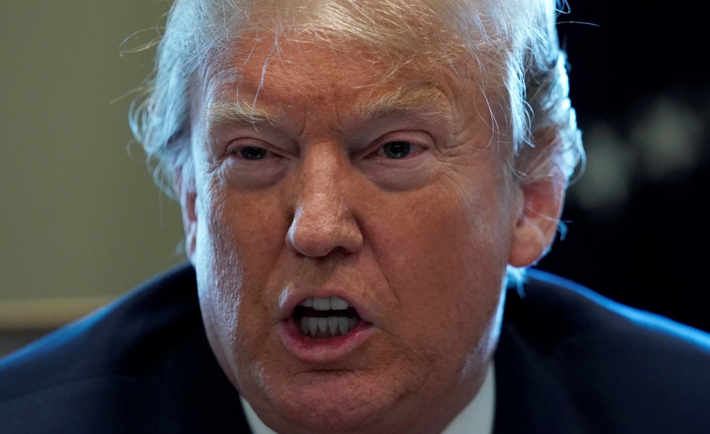 U.S. President Donald Trump holds a cabinet meeting at the White House in Washington, U.S., April 9, 2018. REUTERS/Kevin Lamarque
