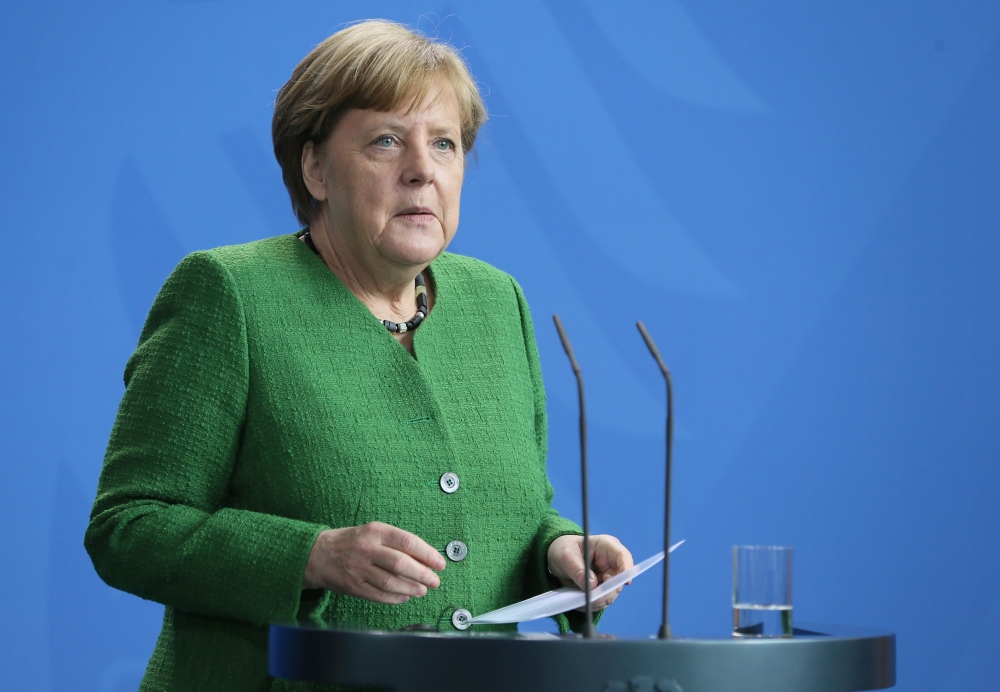 German Chancellor Angela Merkel and Serbian President Aleksandar Vucic (not seen) hold a joint press conference prior to their meeting in Berlin, Germany on April 13, 2018. Cüneyt Karada? - Anadolu 
