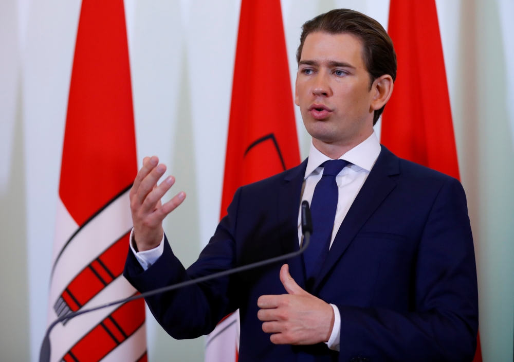 Austria's Chancellor Sebastian Kurz attends a news conference after a cabinet meeting in Vienna, Austria April 18, 2018. REUTERS/Leonhard Foeger
