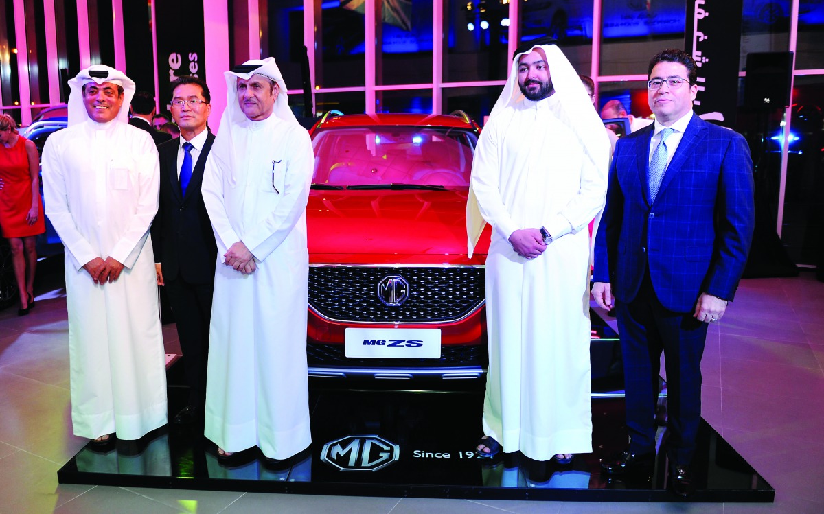 Hussain Ahmad Al Siddiqi, (second left) Deputy CEO, NBK; Sheik Nasser bin Nawaf, (second right), Second Deputy CEO; Ihab El Feky (right), Automotive Director, NBK Holding; and Tom Lee (second left), Managing Director of MG Motors, on the launch of MG new 