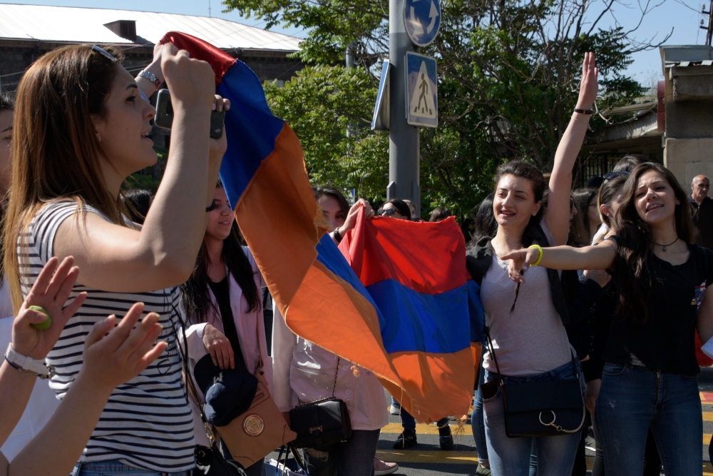 2 converged on the capital, blocking roads and government buildings, as popular anger exploded over the ruling party's rejection of opposition leader Nikol Pashinyan's premiership bid. In an unprecedented show of defiance, protesters paralysed Yerevan, wi