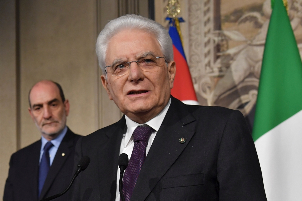 :Italian President Sergio Mattarella addresses journalists after consultations with political parties, on May 7, 2018 at the Quirinale palace in Rome.  AFP / Andreas SOLARO
