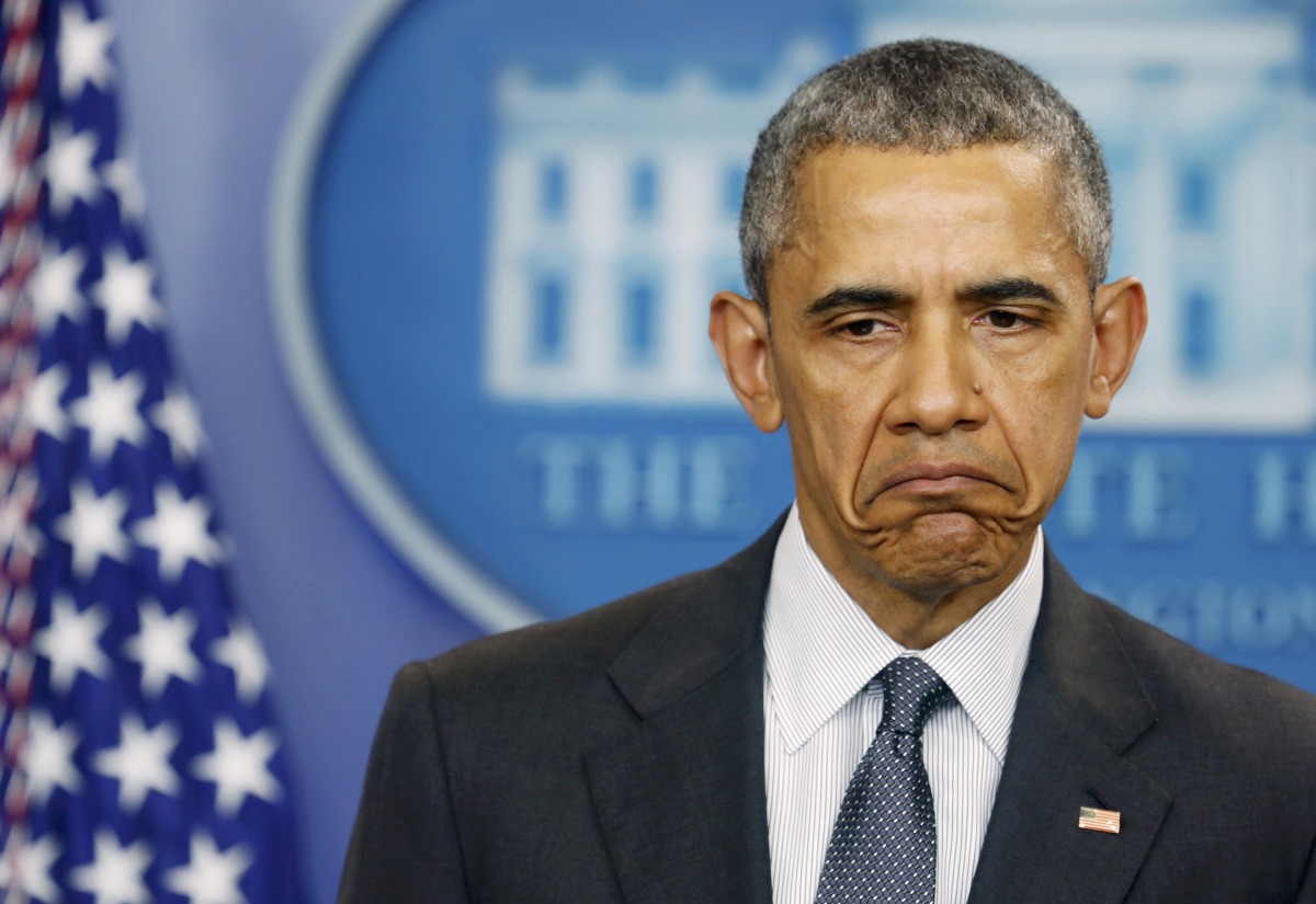 FILE PHOTO: Barack Obama reacts to a question while delivering remarks on the economy in the White House press briefing room in Washington, April 5, 2016. Reuters/Gary Cameron
