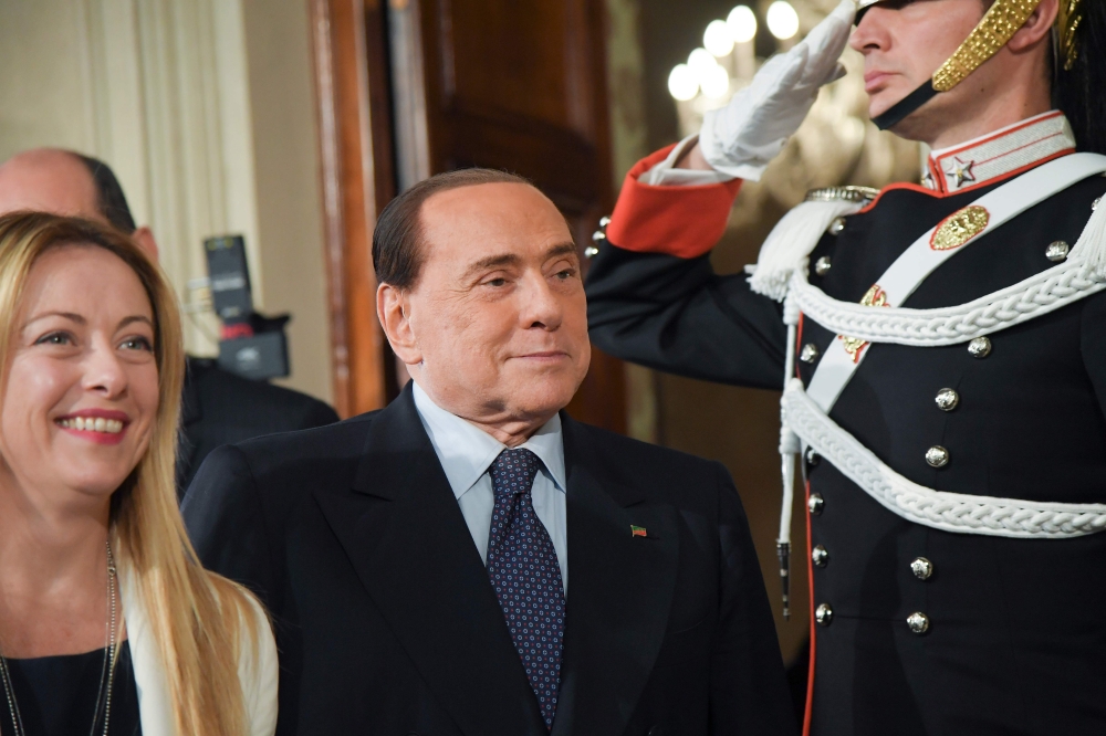 Silvio Berlusconi (C), leader of the right-wing party 