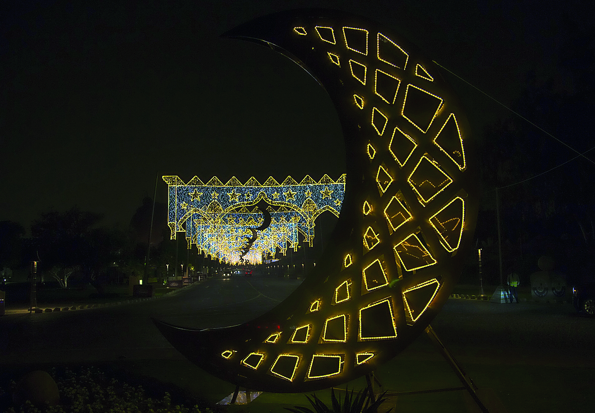 A street along Katara Cultural Village is seen illuminated. 