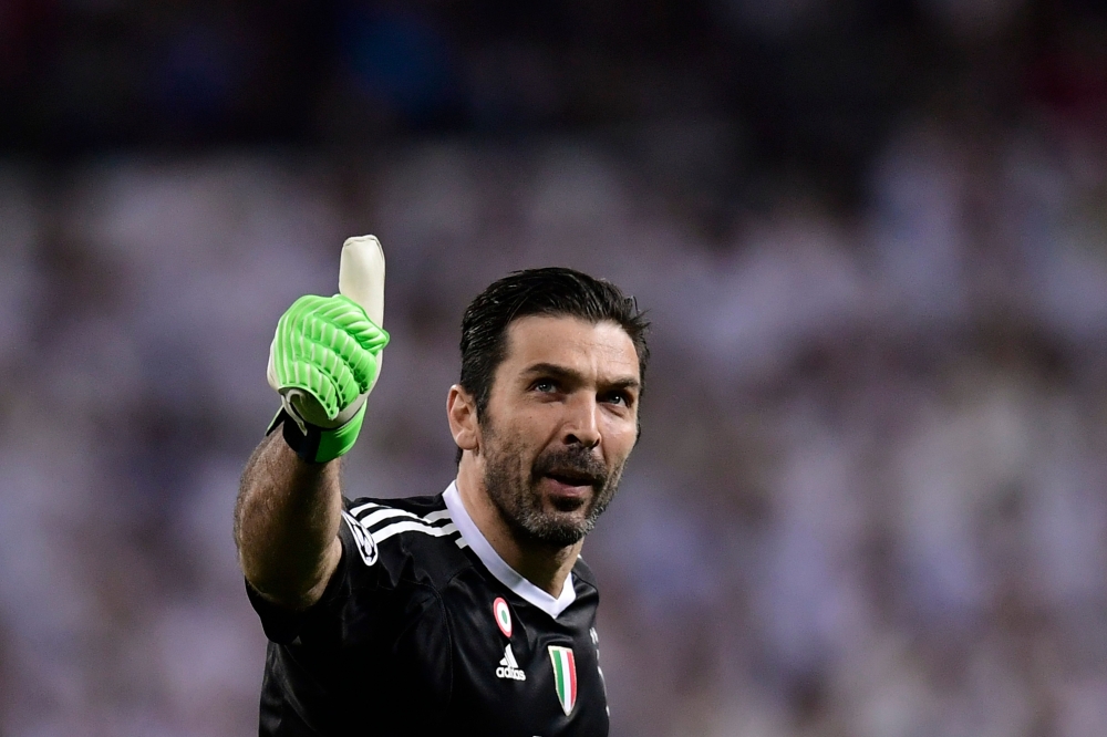 (FILES) In this file photo taken on April 11, 2018 Juventus' Italian goalkeeper Gianluigi Buffon gives the thumb up during the UEFA Champions League quarter-final second leg football match between Real Madrid CF and Juventus FC at the Santiago Bernabeu st