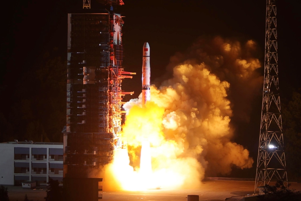 A Long March-4C rocket lifts off from the southwestern Xichang launch centre carrying the Queqiao (