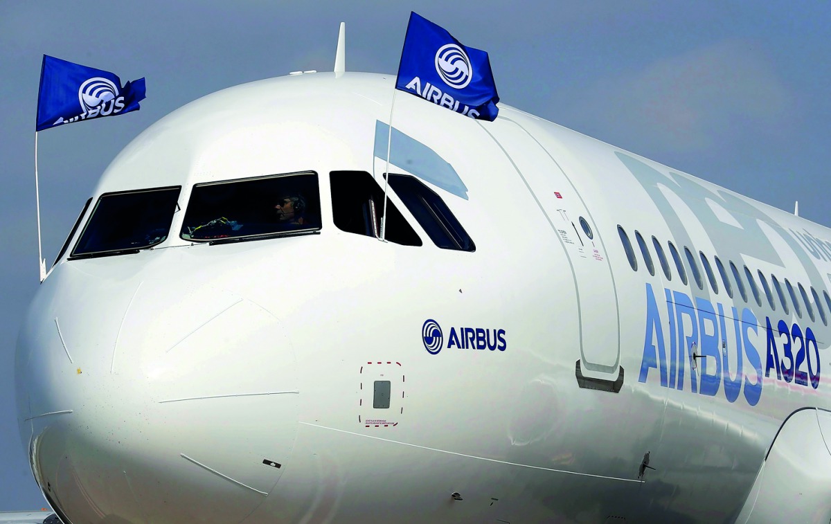Flight test engineers drive the Airbus A320neo (New Engine Option) after its first flight in Colomiers near Toulouse, southwestern France, September 25, 2014. Reuters/Regis Duvignau