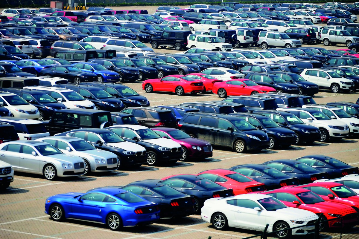 This file picture taken on April 17, 2017 shows imported cars parking at a parking lot near a port in Qingdao, east China's Shandong province. China will cut tariffs on most imported cars to 15 percent from July 1, the finance ministry said on May 22, 201