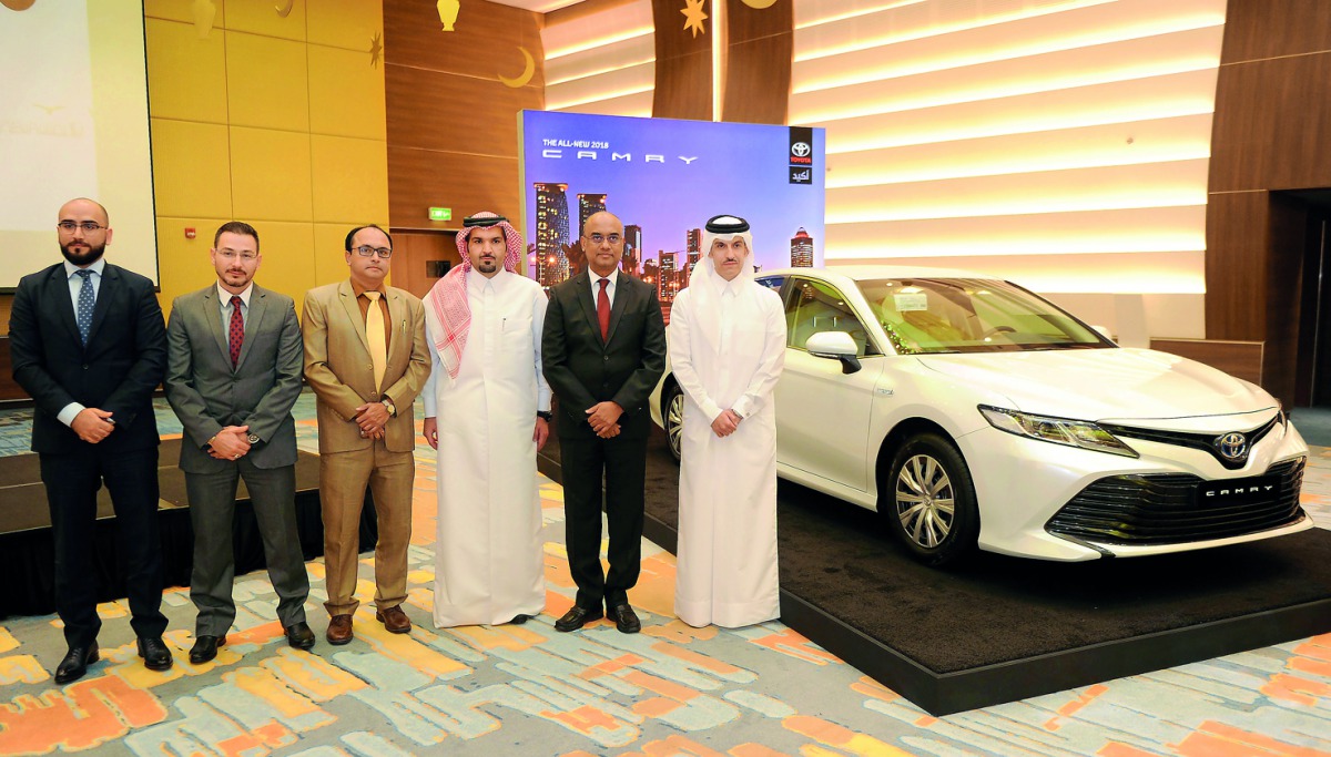R K Murugan (second right), AAB Acting CEO, and Hamad Sharif Al Emadi, Al Ijarah Holding CEO, (right), with other officials at the launch. Pic: Abdul Basit / The Peninsula