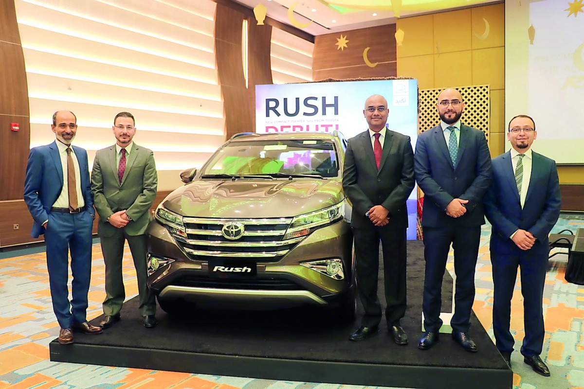 Officials with the new Rush during the launching ceremony. 