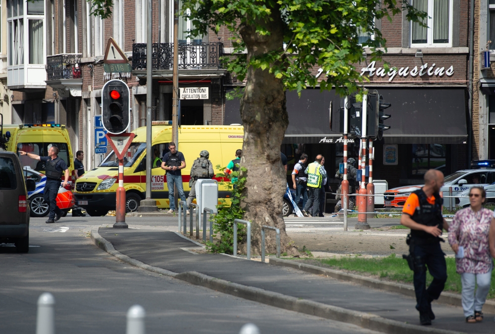 Police officers are seen after a shooting in Liege, Belgium, May 29, 2018. REUTERS/Thomas Van Ass
