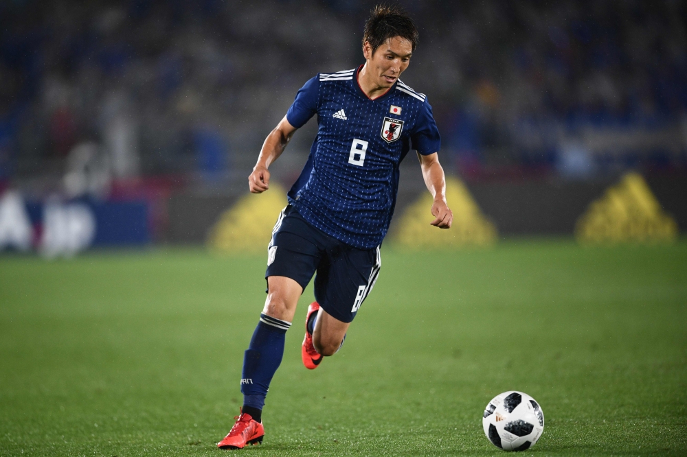 Japan's National football team midfielder Genki Haraguchi controls the ball, during their international friendly football match between Japan and Ghana at the Nissan stadium in Yokohama, on May 30, 2018. / AFP / Martin BUREAU
