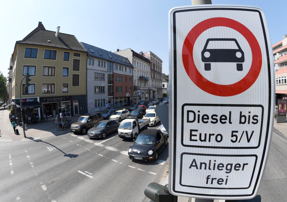 A traffic sign, which bans diesel cars is pictured at the Max-Brauer Allee in downtown Hamburg, Germany, May 31, 2018. REUTERS/Fabian Bimmer