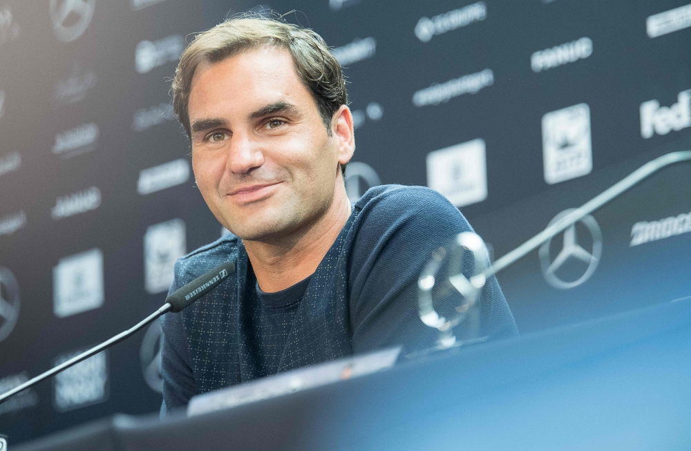 Switzerland's Roger Federer attends a press conference prior the ATP Cup tennis tournament in Stuttgart, southwestern Germany on June 11, 2018. AFP / Sebastian Gollnow
