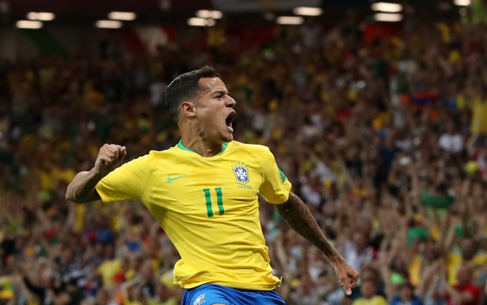 Brazil's Philippe Coutinho celebrates scoring their first goal. Reuters/Marko Djurica

