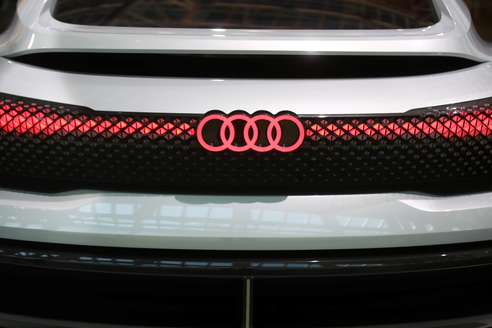 FILE PHOTO: Audi sign is seen on the show car at the Audi Forum before the company's annual shareholders meeting in Ingolstadt, Germany May 9, 2018. REUTERS/Michael Dalder
