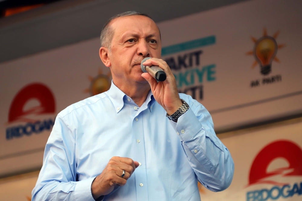 Turkish President and the leader of the Justice and Development Party (AK Party) Recep Tayyip Erdogan addresses the crowd during Turkey's ruling AK Party’s rally in Mardin, Turkey on June 20, 2018. (Osman Öksüz - Anadolu Agency)