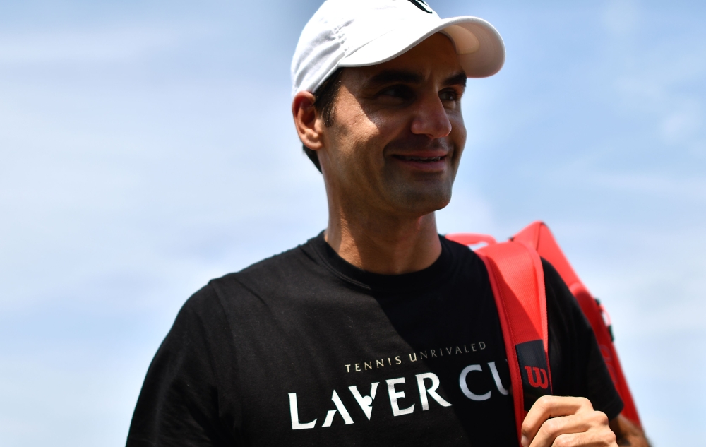 Switzerland's Roger Federer leaves the practice court at The All England Tennis Club in Wimbledon, southwest London, on July 1, 2018, on the eve of the 2018 Wimbledon Championships tennis tournament. AFP / Ben STANSALL 