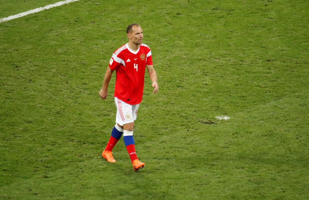  Russia's Sergei Ignashevich after scoring during the penalty shootout REUTERS/Christian Hartmann
 