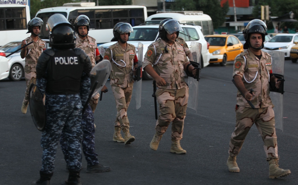 Members of the Iraqi security forces are deployed in the capital Baghdad's Tahrir Square during demonstrations against unemployment on July 14, 2018. AFP / AHMAD AL-RUBAYE