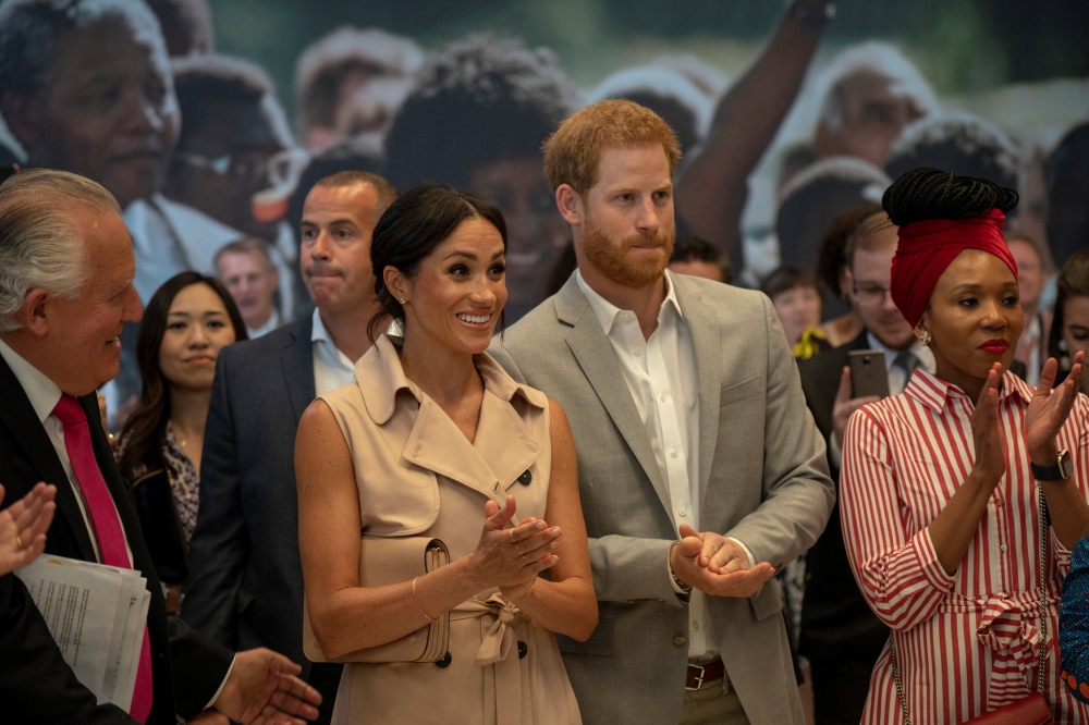 Britain's Prince Harry and Meghan, the Duchess of Sussex, visit the Nelson Mandela Centenary Exhibition at Southbank Centre's Queen Elizabeth Hall in London, Britain, July 17, 2018. Arthur Edwards/Pool via REUTERS