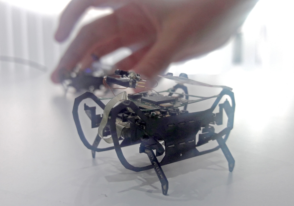 Engine maker Rolls-Royce demonstrates one of its robots, inspired by snakes and cockroaches, that could be used in the future to help it inspect and repair engines, at the Farnborough International Airshow, July 17, 2018. Reuters/Victoria Bryan