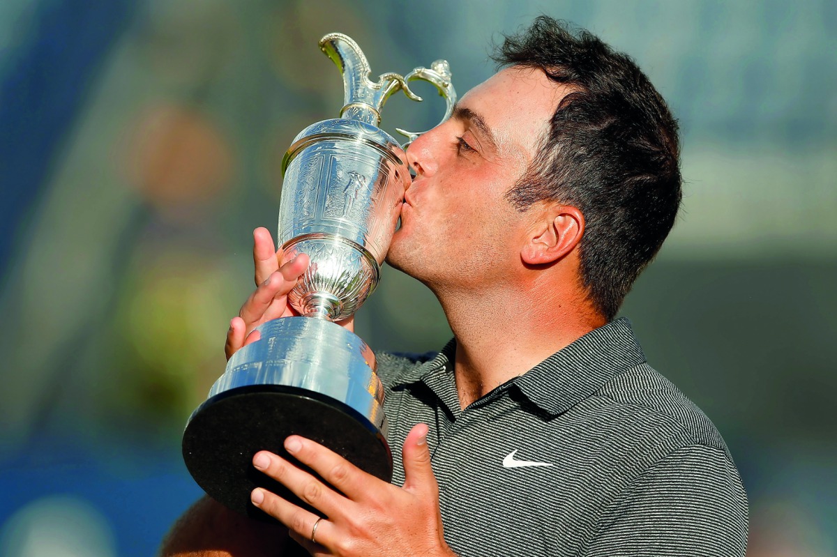 Italy's Francesco Molinari kisses the Claret Jug after winning the 147th Open Championship. Reuters/Andrew Yates

