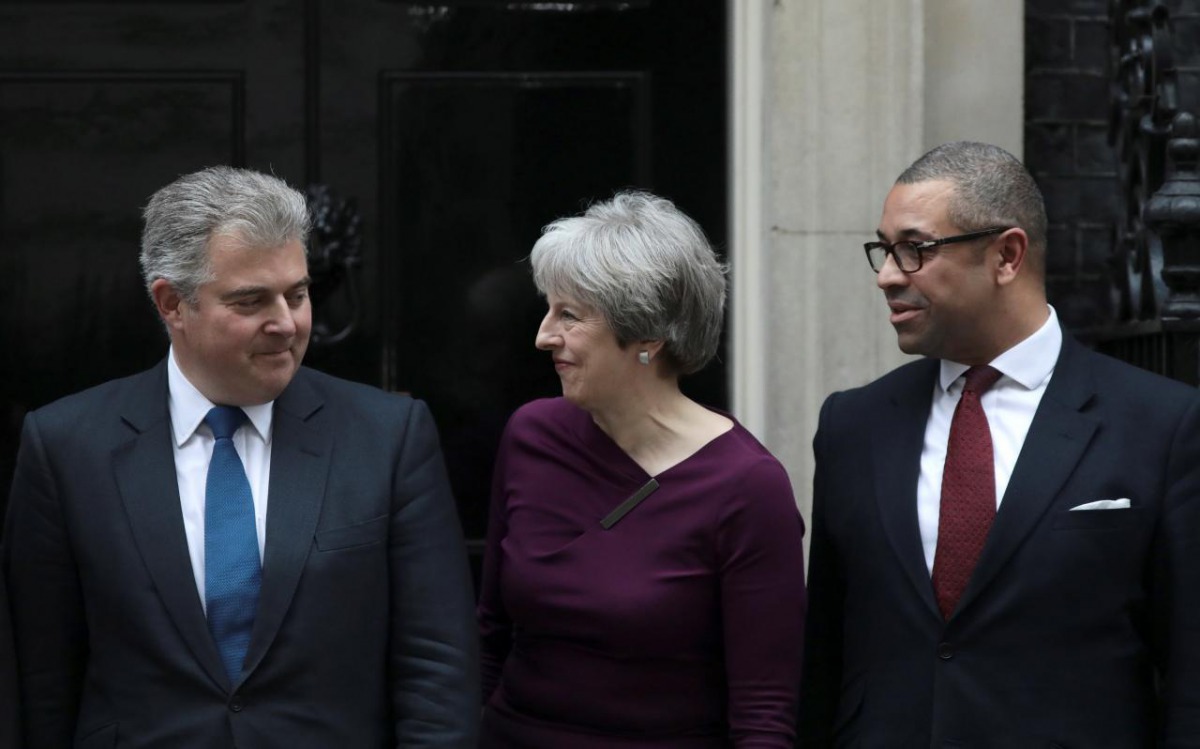 Britain's Prime Minister Theresa May poses with Brandon Lewis and James Cleverly outside 10 Downing Street, London, January 8, 2018. Reuters/Simon Dawson