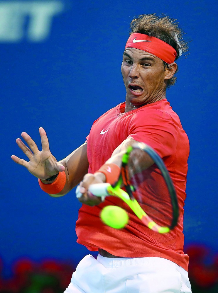 Rafael Nadal of Spain plays a shot against Benoit Paire of France during a 2nd round match on Day 3 of the Rogers Cup at Aviva Centre on August 8, 2018 in Toronto, Canada. Vaughn Ridley/Getty Images/AFP