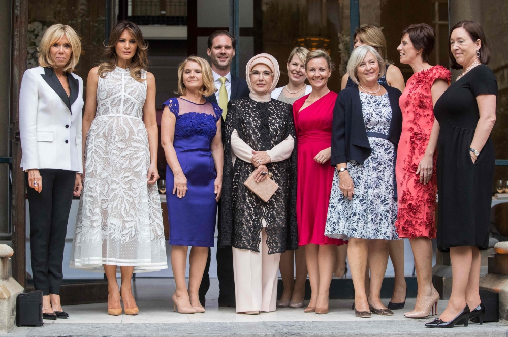 FILE PHOTO:French First lady Brigitte Macron, US First Lady Melania Trump, Malgorzata Tusk, Husband of Luxembourg's pime minister Gauthier Destenay, First Lady of Turkey Emine Gulbaran Erdogan, Partner of Estonia's Prime Minister Karin Ratas, Partner of S