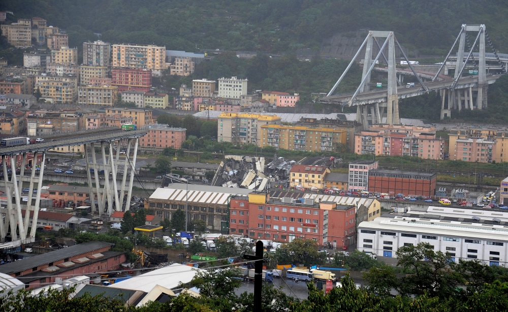The collapsed Morandi Bridge is seen in the Italian port city of Genoa August 14, 2018. REUTERS