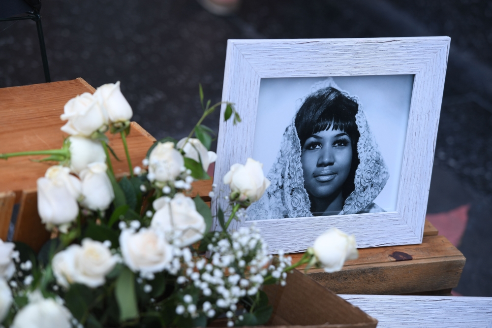 Flowers and tributes are placed on the Star for Aretha Franklin on the Hollywood Walk of Fame in Hollywood, California, August 16, 2018, following the death of the music icon, legendary singer and 