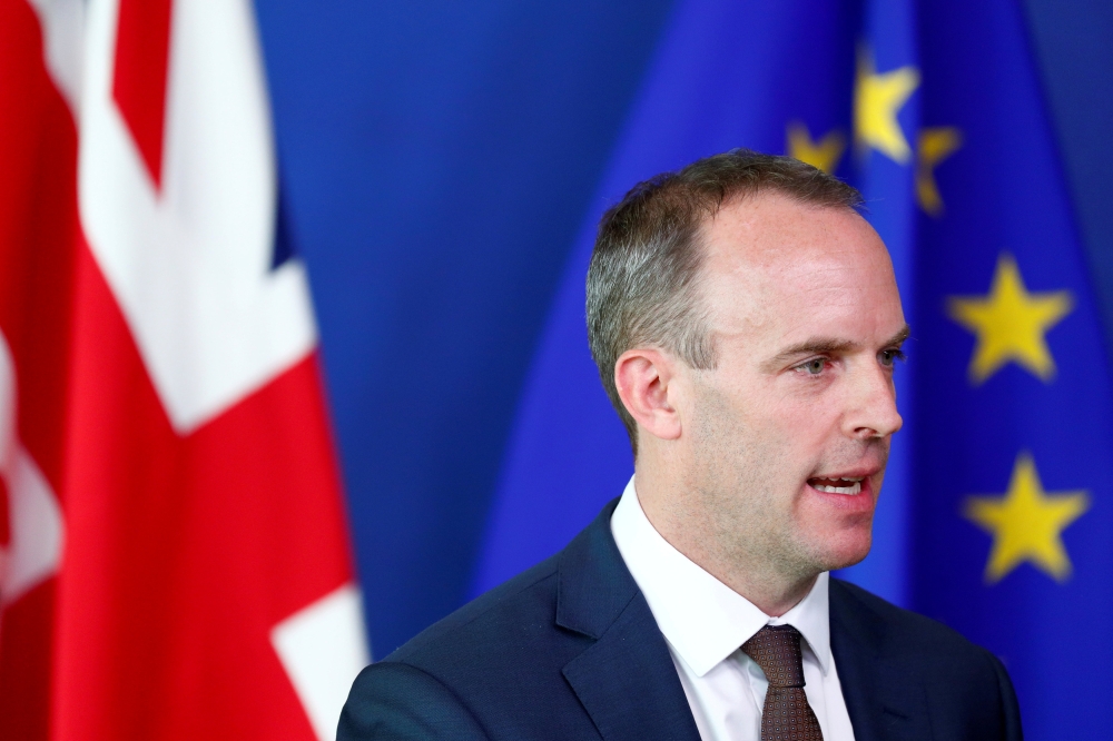 File photo of Britain's Secretary of State for Exiting the European Union, Dominic Raab attends a media briefing with European Union's chief brexit negotiator, Michel Barnier, after a meeting at the EU Commission headquarters in Brussels, Belgium August 2