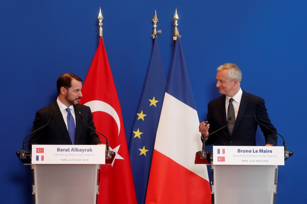 French Finance Minister Bruno Le Maire and Turkish Finance Minister Berat Albayrak attend a joint news conference after a meeting at the Bercy Finance Ministry in Paris, France, August 27, 2018. REUTERS/Benoit Tessier