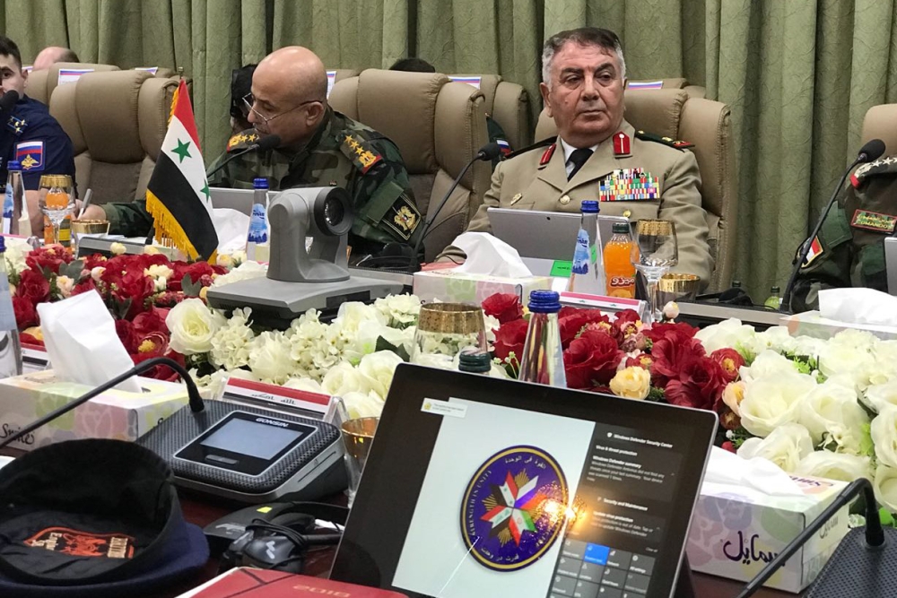 Syrian military commanders seated during a security cooperation and information-sharing meeting with their Iraqi, Iranian, and Russian counterparts in the Iraqi capital Baghdad. AFP
