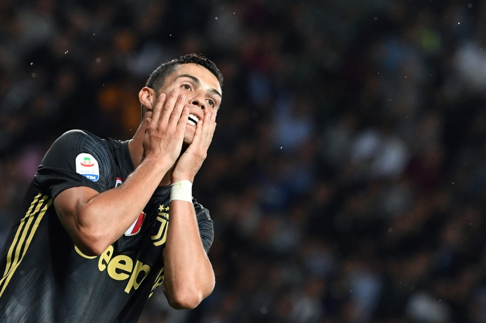 Juventus' Portuguese forward Cristiano Ronaldo reacts during the Italian Serie A football match Parma vs Juventus on September 1, 2018 at Ennio Tardini stadium in Parma. / AFP / Andreas SOLARO
