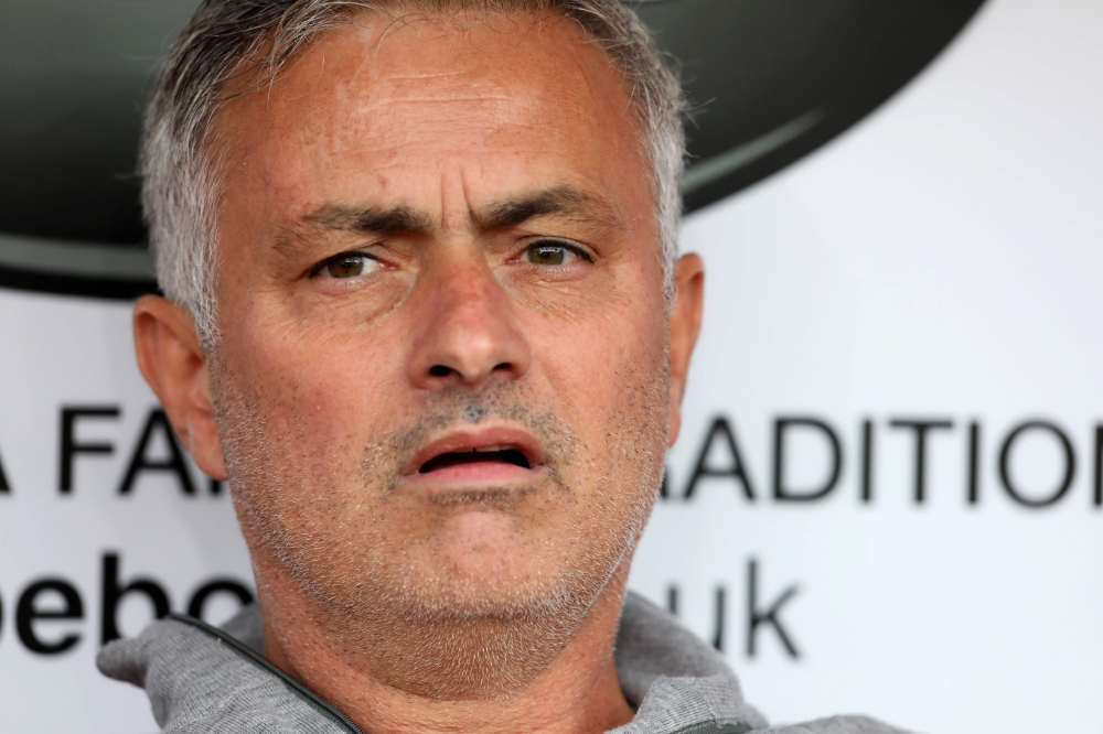 Manchester United's Portuguese manager Jose Mourinho gestures after the final whistle of the English Premier League football match between Burnley and Manchester United at Turf Moor in Burnley, north west England on September 2, 2018.  AFP / Lindsey PARNA