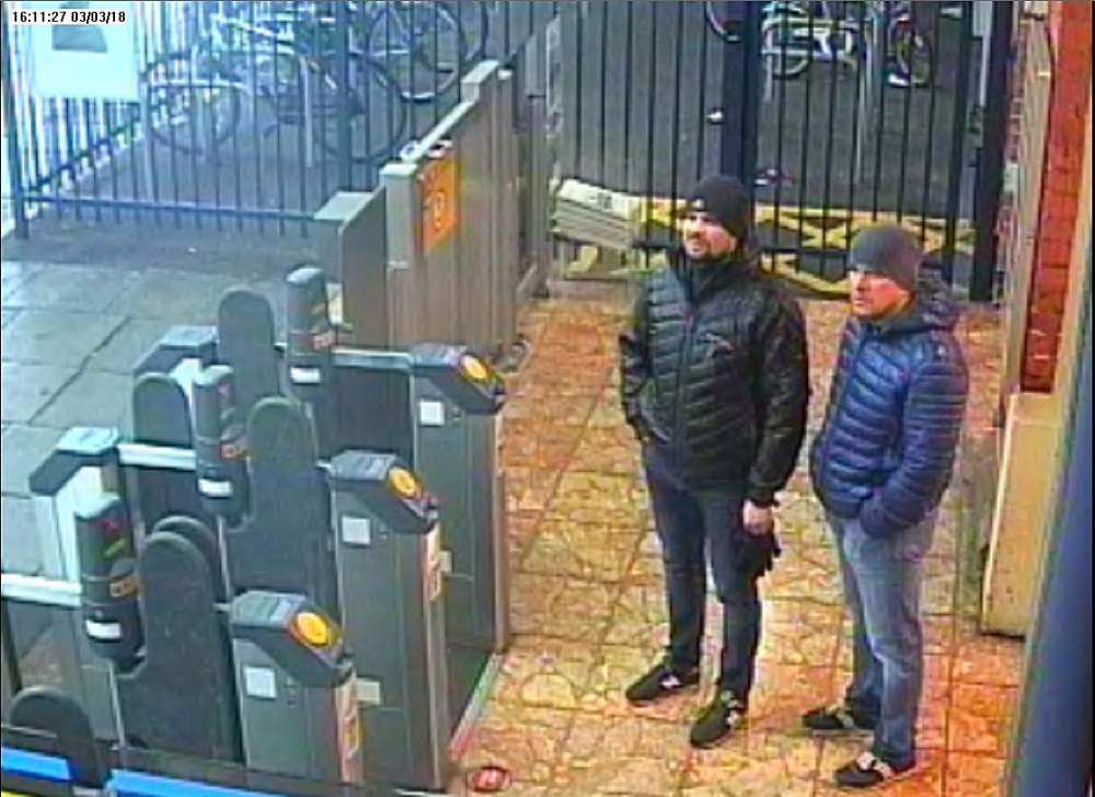 A handout picture taken at Salisbury train station in Salisbury, west of London on March 3, 2018, and released by the British Metropolitan Police Service in London on September 5, 2018, shows Alexander Petrov (R) and Ruslan Boshirov, who are wanted by Bri